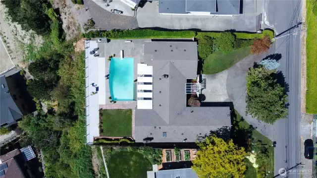 No need to worry about parking with a two-car garage, parking pad, and a circular driveway
