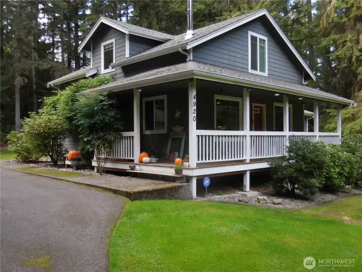 Covered Lighted Front Wrap around Porch