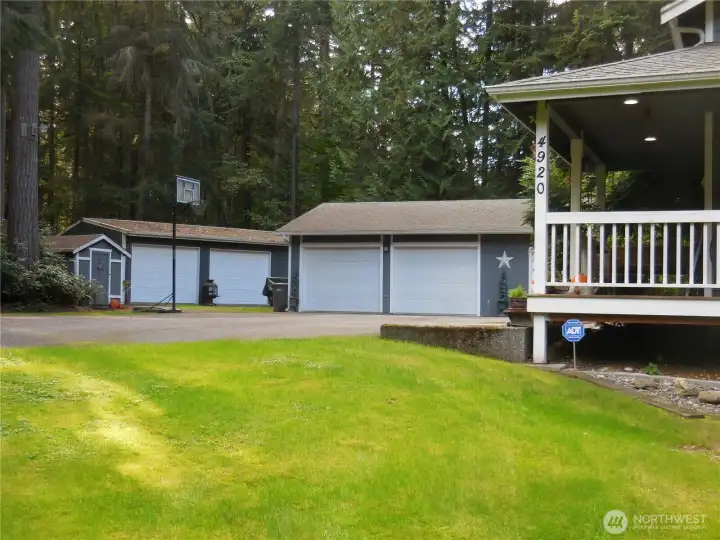 Large area asphalted Parking Pad for the 1800 plus Sq Foot of Detached Garages & Shops!! Woo Hoo-honey I am going to the Shop.. Which One she asks??
