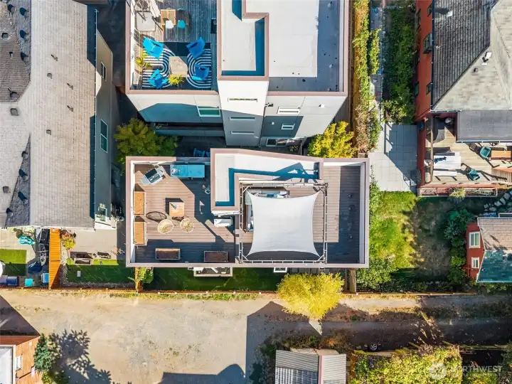 Expansive roof top with views of rainier and the space needle.