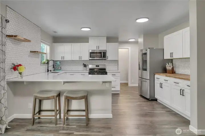 Farmhouse charm meets everyday function in this thoughtfully updated kitchen—perfect for everything from weeknight dinners to holiday hosting.