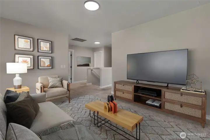 A spacious upstairs loft offering flexibility for a TV room, play area, or home office—your space, your way. Image is virtually staged.