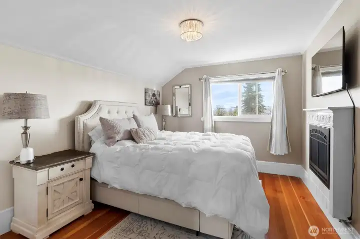 Primary bedroom filled with natural light
