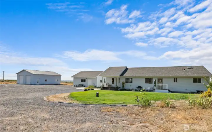 Welcome Home! Beautiful 360 degree views abound from this rambler on shy 5 acres.