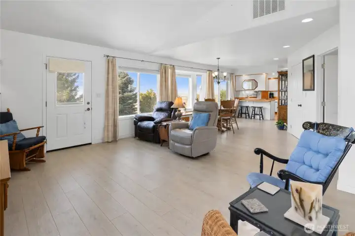 View from living room looking back towards dining room, access to back porch and back yard area.