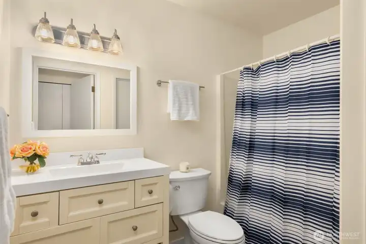 Main floor bathroom with cozy heated floors.