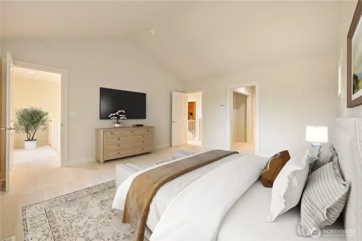 Primary bedroom with walk in ensuite, walk in closets, and landing/catwalk to private balcony off main