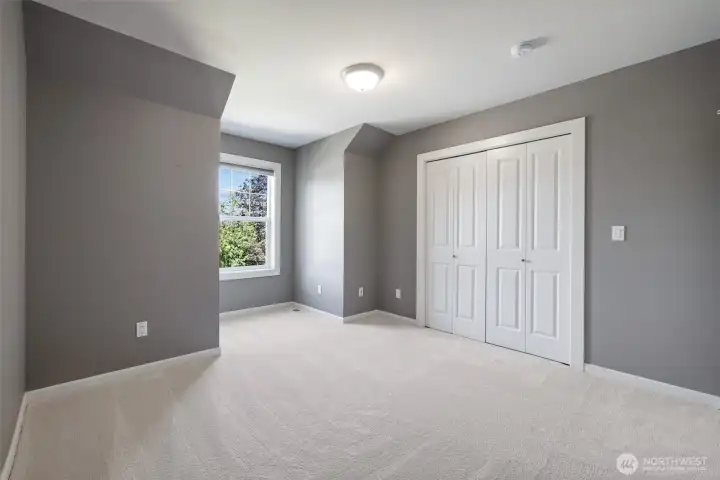 Front bedroom with multiple closet/storage options