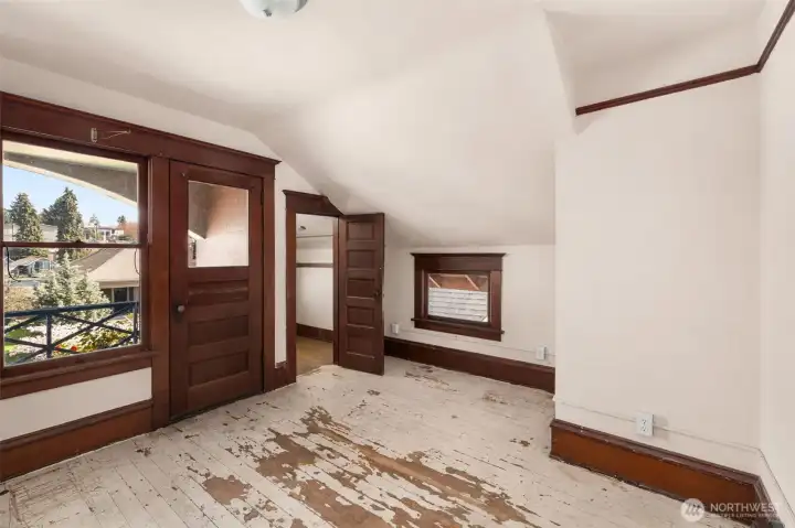 Second bedroom with walk-in closet and door to patio