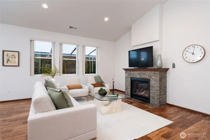 Living room with large windows - recent interior paint restored this house back to a model home feel.