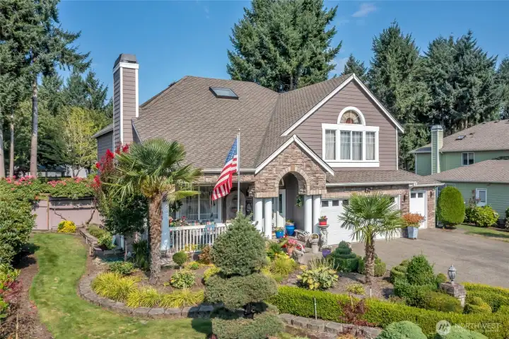 Meticulously landscaped grounds with charming curb appeal.