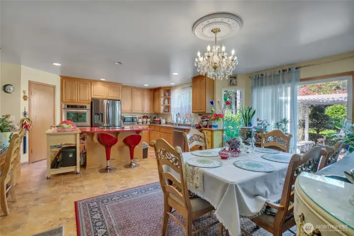 Casual dining space seamlessly connected to the kitchen and family room.