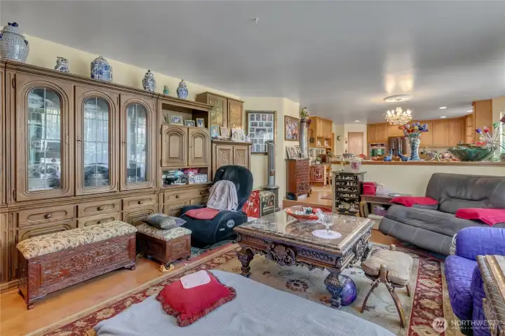 Inviting Family Room – Warm and welcoming with a fireplace, built-in shelving, and thoughtful design details.
