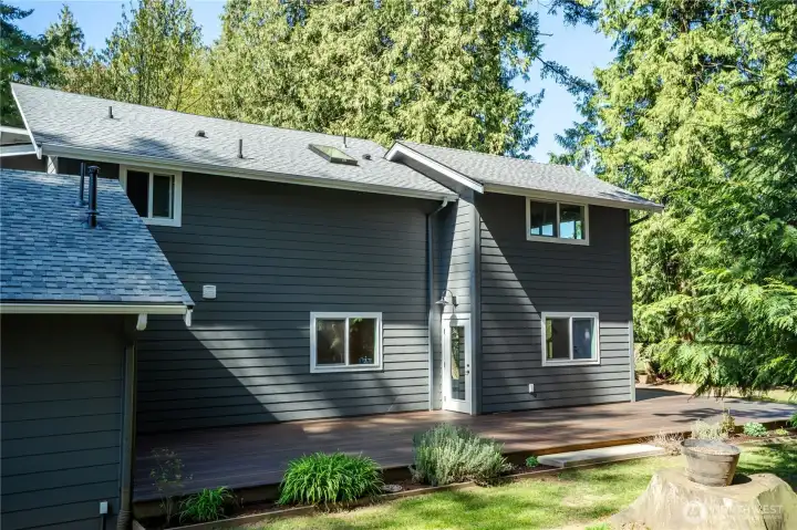 East side of the house. The door is off the dining room