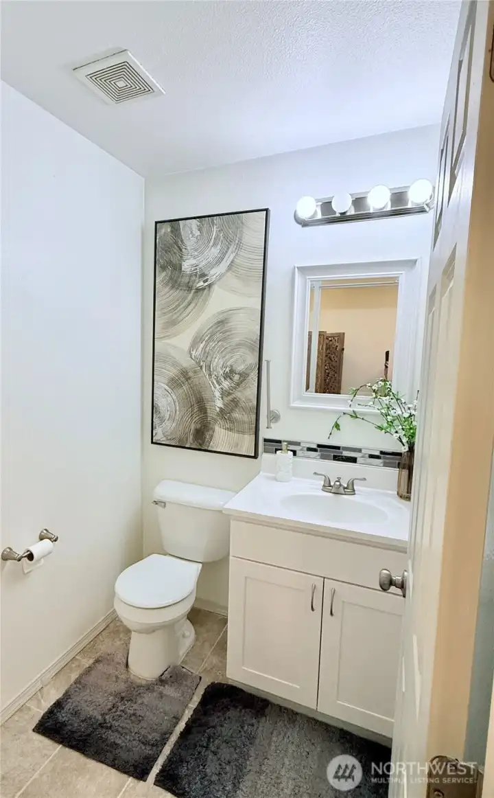 Half bath downstairs is perfect for your visitors.