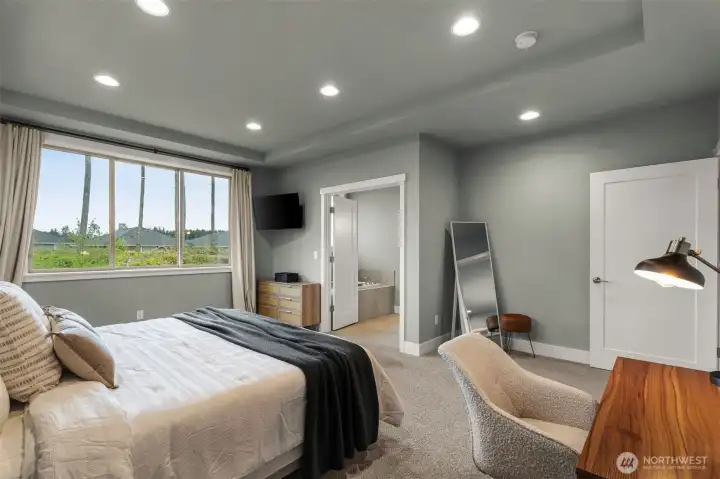 Sneak away to your large owner suite, with greenbelt views - it's an actual oasis.