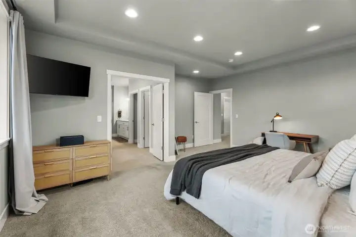 On suite entrance with grand french doors.