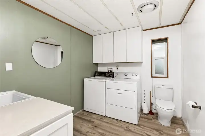 Oversized laundry room and 1/2 bath