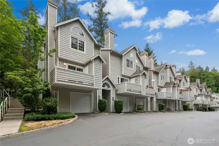 End-unit location with convenient access and two dedicated parking spaces. End-unit location with convenient access and two dedicated parking spaces.