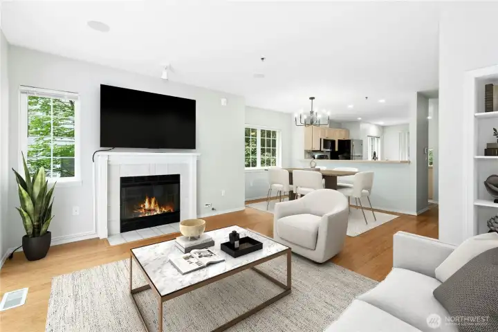 Virtually Staged - Bright living room with vaulted ceilings, gas fireplace, and abundant natural light. Virtually Staged - Bright living room with vaulted ceilings, gas fireplace, and abundant natural light.
