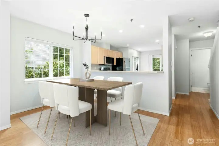 Virtually Staged - Open dining area with seamless flow between the kitchen and living room. Virtually Staged - Open dining area with seamless flow between the kitchen and living room.