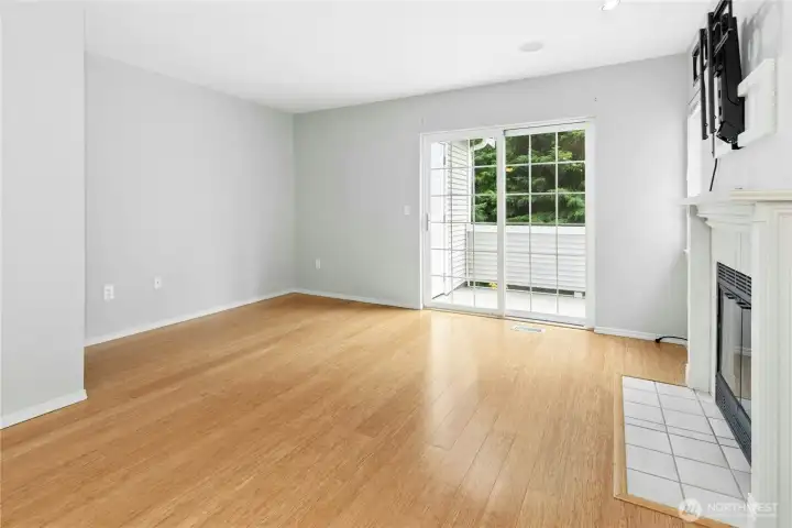 Living room with gas fireplace and open layout connecting to the dining area and kitchen. Living room with gas fireplace and open layout connecting to the dining area and kitchen.