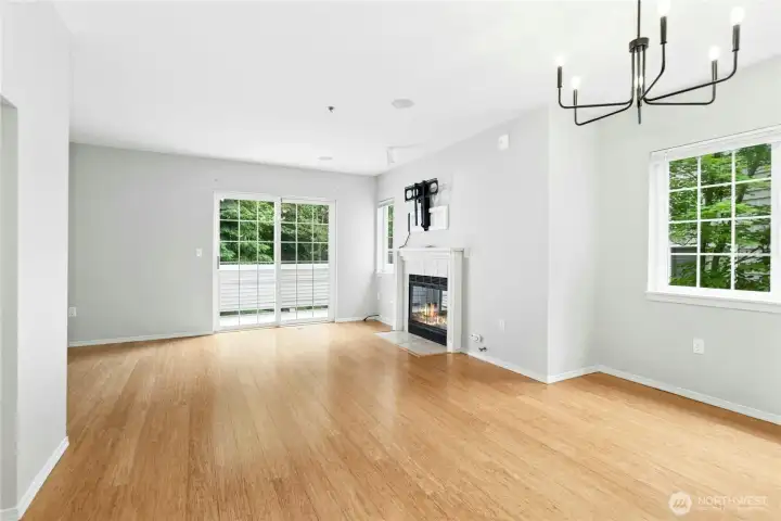 Open floor plan offers comfortable flow between the living room, dining area, and kitchen. Open floor plan offers comfortable flow between the living room, dining area, and kitchen.