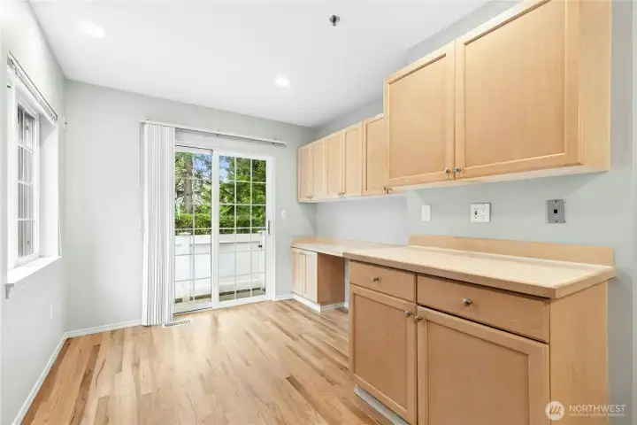 Alternate view of the bright breakfast nook with large windows overlooking the rear deck and treed setting. Alternate view of the bright breakfast nook with large windows overlooking the rear deck and treed setting.