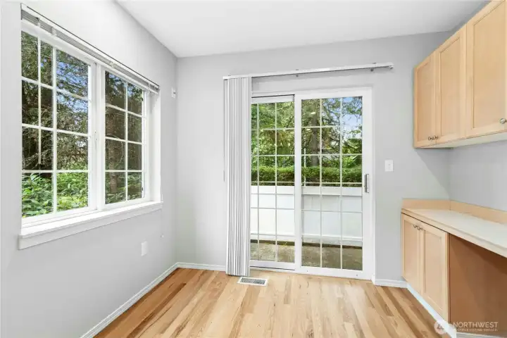 Breakfast nook with sliding glass door providing direct access to the private rear deck. Breakfast nook with sliding glass door providing direct access to the private rear deck.