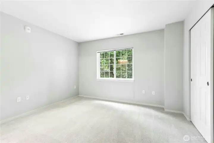Second bedroom with large window and generous closet space. Second bedroom with large window and generous closet space.