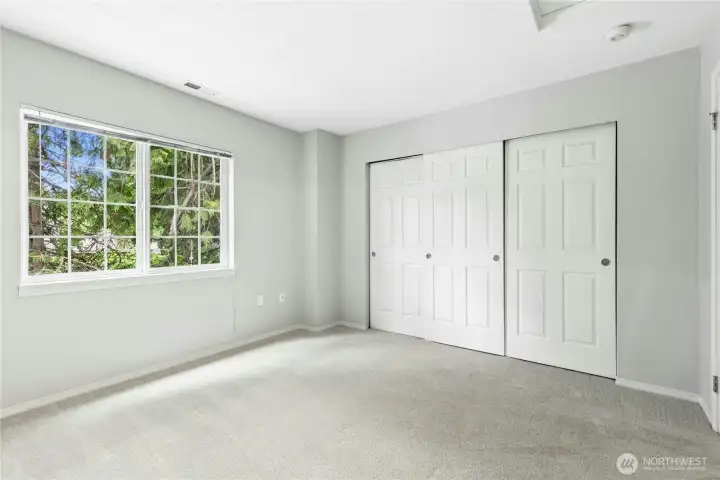 Alternate view of the second bedroom with large window and generous closet space. Alternate view of the second bedroom with large window and generous closet space.