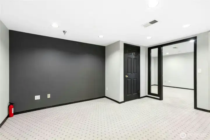 Finished lower-level flex space with private exterior entrance, offering over 400 square feet of additional finished space not included in the reported living area. Finished lower-level flex space with private exterior entrance, offering over 400 square feet of additional finished space not included in the reported living area.