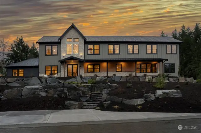 Experience the pinnacle of luxury living in this unparalleled new construction at Gig Harbor's esteemed Canterwood Golf and Country Club.