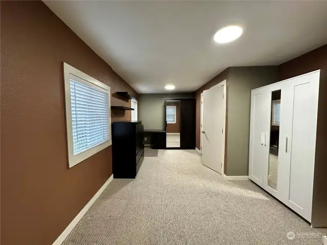 Master bedroom has perfect size of desk, wardrobe closet with drawers