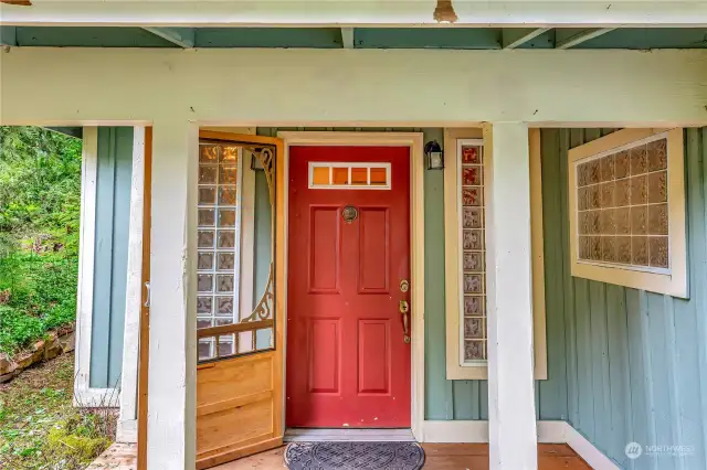 A quaint covered porch welcomes you!