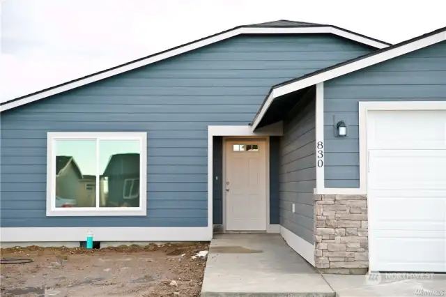 The home will feature stucco with a covered back patio, and the builders have full discretion over the exterior design.