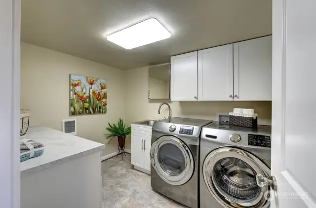 Laundry With Sink and a place to fold your clothes.