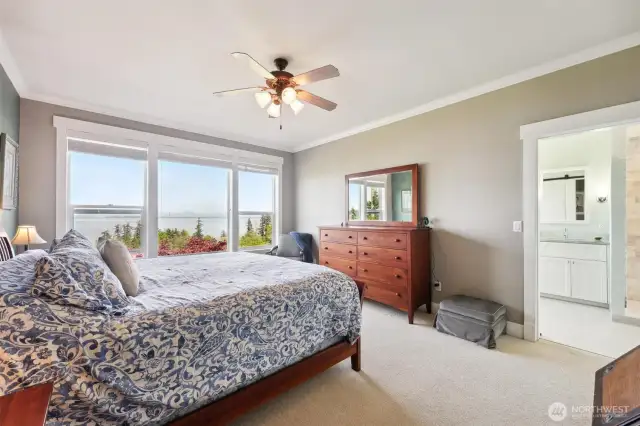 Wake up to the incredible views from the primary bedroom complete with walk-in closet and ensuite.