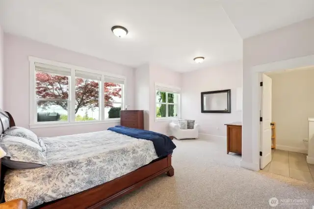 The main floor bedroom has its own half bathroom.