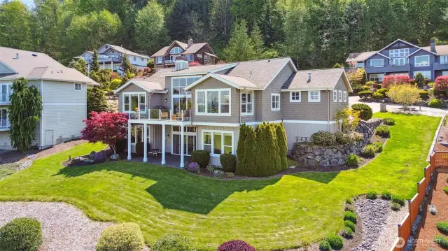 The surrounding greenspace enhances the curb appeal of this gorgeous home.