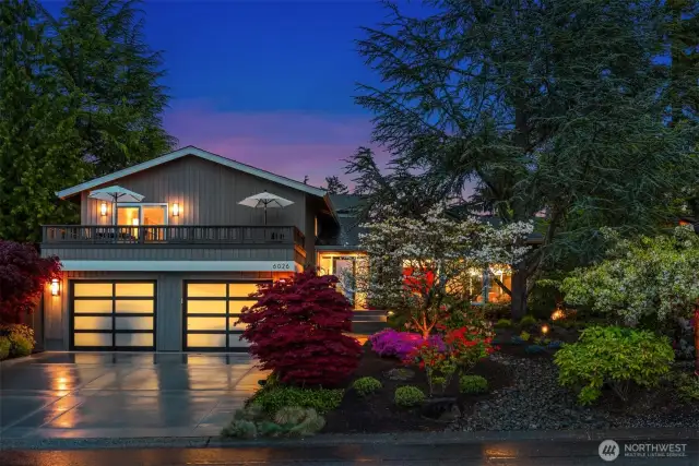Nestled on a quiet cul-de-sac, this stunning NW Contemporary gem offers the perfect blend of sophisticated design and Pacific Northwest beauty. The completely reimagined interior showcases sleek lines, walls of glass, and premium finishes throughout. Entertain effortlessly in the minimalist chef's kitchen with dramatic black countertops while enjoying breathtaking Lake Washington and Olympic Mountain views. Enjoy Lake & sunset views on the spacious deck or stroll through meticulously landscaped gardens and private backyard. Ideally located minutes from downtown Kirkland, Lake Washington, Metropolitan Market, and the Cross Kirkland Corridor trail. Modern luxury meets perfect location!