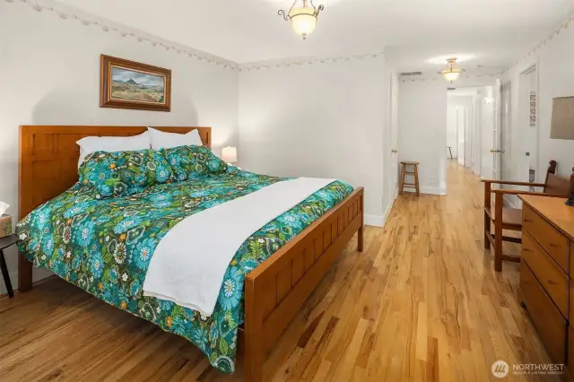 Primary toward the hallway leading to the other two bedrooms