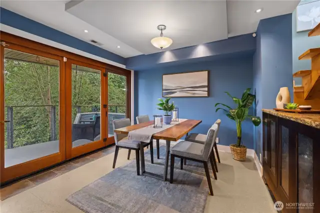 Dining room and buffet area.  NANA door opens like an accordion to create larger summer living spaces.