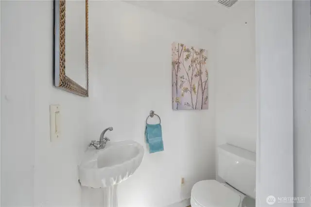 Powder room behind the kitchen