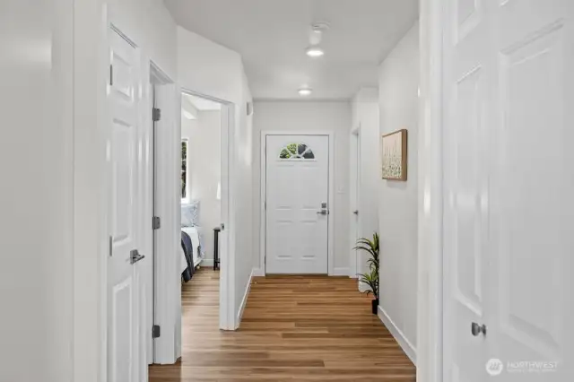 2 main floor Primary bedrooms with attached bathrooms