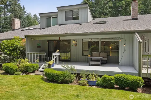 Before guiding you through this beautiful home, let's start with the best scene: on your expansive back deck, which opens onto a park-like open setting.