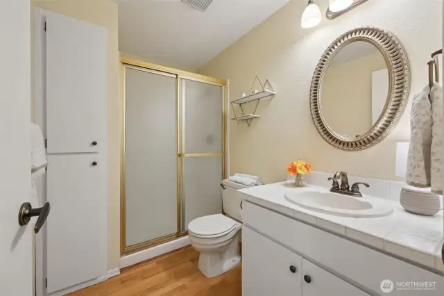Across the hall is the main floor three-quarter bath.