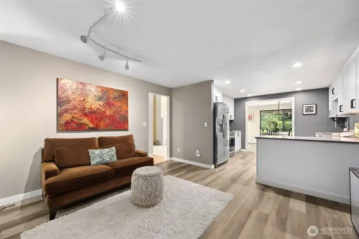 Looking into the kitchen from the open bonus room.