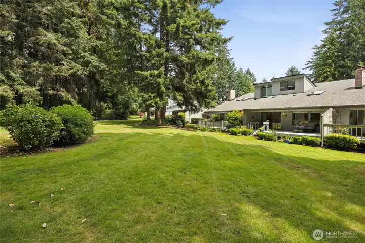 The grassy lawn is community space, open to your neighbors, but enjoyed mostly by you.