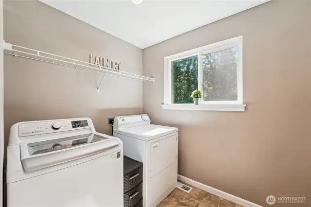 Bright laundry room on main floor